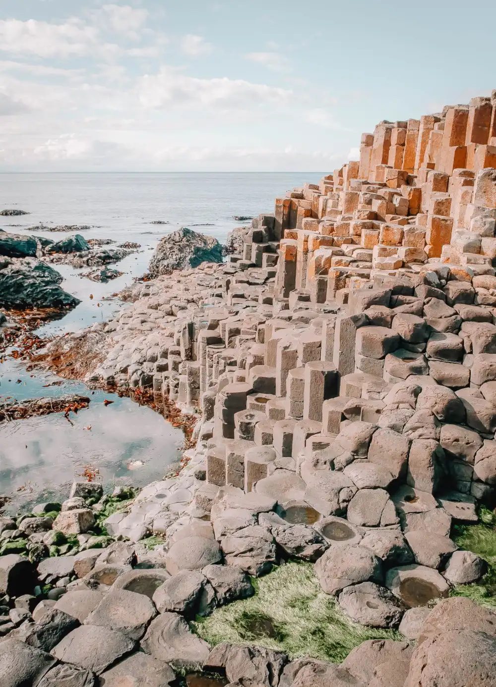 Hexagonal basalt columns of the Giant's Causeway stepping down to the sea